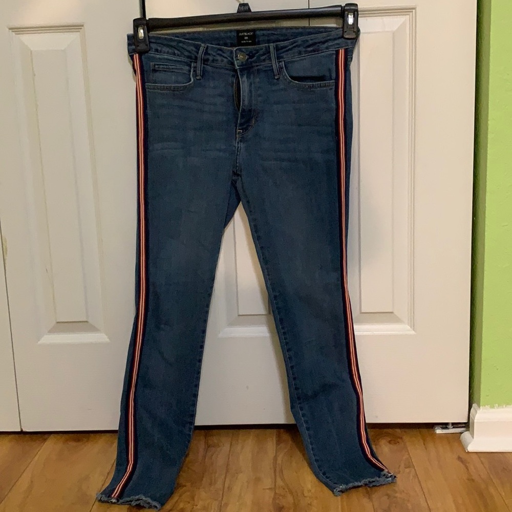 Just black jeans with red stripe detail